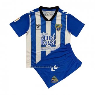 Camiseta Malaga Primera Nino 2022-23